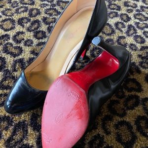 Christian Louboutin black pumps